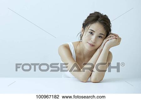 Studio portrait of attractive young Japanese woman View Large Photo Image Stock Image - Studio portrait of attractive young Japanese woman. Fotosearch