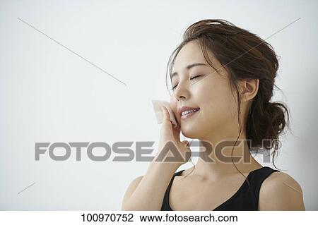 Studio portrait of attractive young Japanese woman View Large Photo Image Stock Image - Studio portrait of attractive young Japanese woman. Fotosearch
