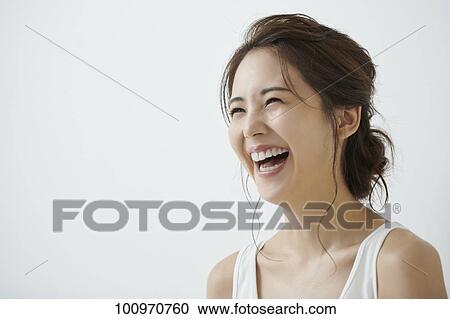Studio portrait of attractive young Japanese woman View Large Photo Image Stock Image - Studio portrait of attractive young Japanese woman. Fotosearch