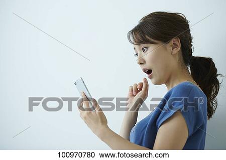 Studio portrait of attractive young Japanese woman View Large Photo Image Stock Image - Studio portrait of attractive young Japanese woman. Fotosearch