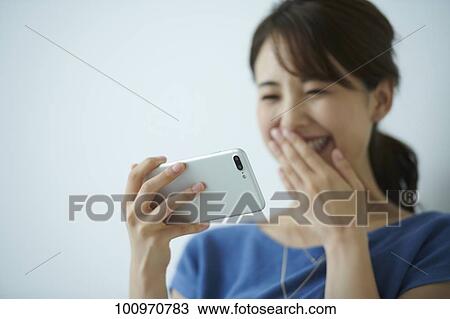 Studio portrait of attractive young Japanese woman View Large Photo Image Stock Image - Studio portrait of attractive young Japanese woman. Fotosearch