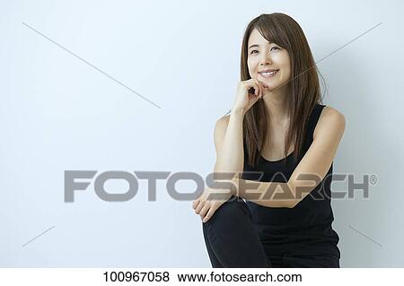 Studio portrait of attractive young Japanese woman View Large Photo Image Stock Photo - Studio portrait of attractive young Japanese woman. Fotosearch