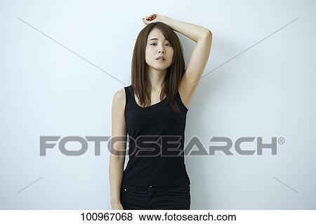 Studio portrait of attractive young Japanese woman View Large Photo Image Stock Photo - Studio portrait of attractive young Japanese woman. Fotosearch