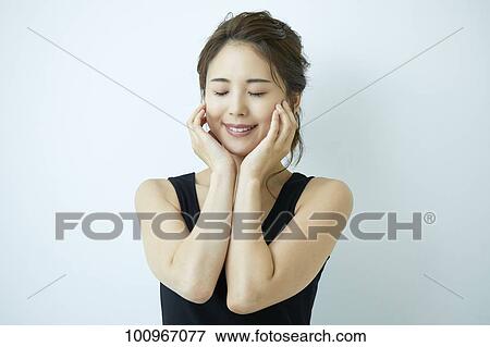 Studio portrait of attractive young Japanese woman View Large Photo Image Stock Photo - Studio portrait of attractive young Japanese woman. Fotosearch