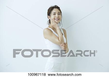 Studio portrait of attractive young Japanese woman View Large Photo Image Stock Photo - Studio portrait of attractive young Japanese woman. Fotosearch