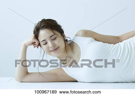 Studio portrait of attractive young Japanese woman View Large Photo Image Stock Photo - Studio portrait of attractive young Japanese woman. Fotosearch