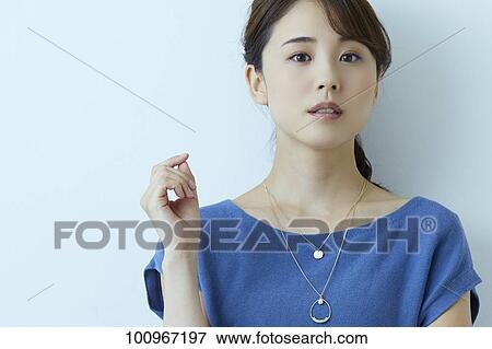 Studio portrait of attractive young Japanese woman View Large Photo Image Stock Photo - Studio portrait of attractive young Japanese woman. Fotosearch