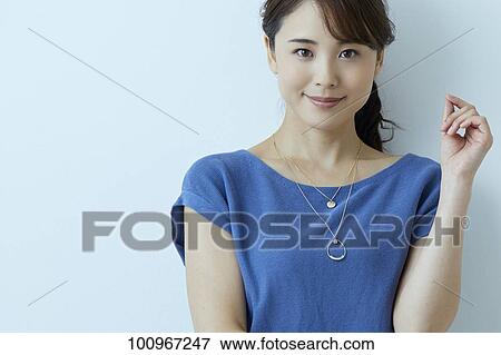 Studio portrait of attractive young Japanese woman View Large Photo Image Stock Photo - Studio portrait of attractive young Japanese woman. Fotosearch