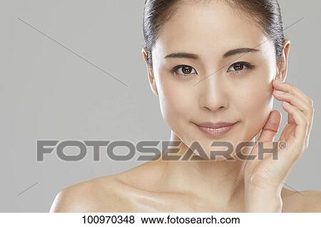 Studio portrait of attractive young Japanese woman View Large Photo Image Stock Photo - Studio portrait of attractive young Japanese woman. Fotosearch