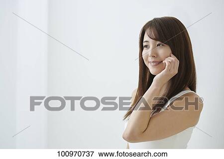 Studio portrait of attractive young Japanese woman View Large Photo Image Stock Photo - Studio portrait of attractive young Japanese woman. Fotosearch