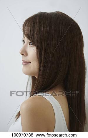 Studio portrait of attractive young Japanese woman View Large Photo Image Stock Photo - Studio portrait of attractive young Japanese woman. Fotosearch