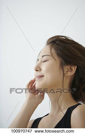 Studio portrait of attractive young Japanese woman View Large Photo Image Stock Photo - Studio portrait of attractive young Japanese woman. Fotosearch