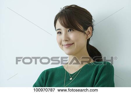 Studio portrait of attractive young Japanese woman View Large Photo Image Stock Photo - Studio portrait of attractive young Japanese woman. Fotosearch