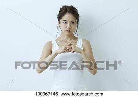 Studio portrait of attractive young Japanese woman View Large Photo Image Stock Photograph - Studio portrait of attractive young Japanese woman. Fotosearch