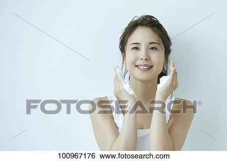 Studio portrait of attractive young Japanese woman View Large Photo Image Stock Photograph - Studio portrait of attractive young Japanese woman. Fotosearch