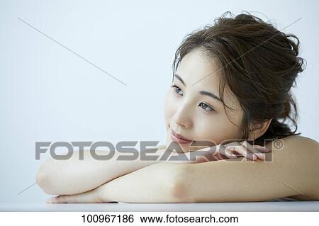 Studio portrait of attractive young Japanese woman View Large Photo Image Stock Photograph - Studio portrait of attractive young Japanese woman. Fotosearch