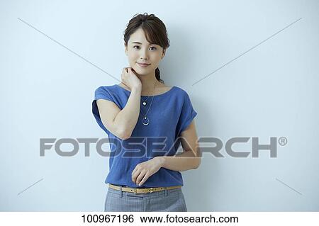 Studio portrait of attractive young Japanese woman View Large Photo Image Stock Photograph - Studio portrait of attractive young Japanese woman. Fotosearch