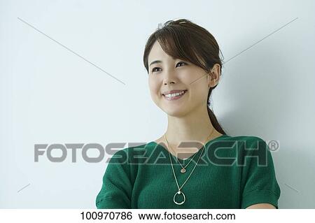 Studio portrait of attractive young Japanese woman View Large Photo Image Stock Photograph - Studio portrait of attractive young Japanese woman. Fotosearch