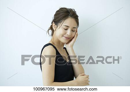 Studio portrait of attractive young Japanese woman View Large Photo Image Stock Photography - Studio portrait of attractive young Japanese woman. Fotosearch