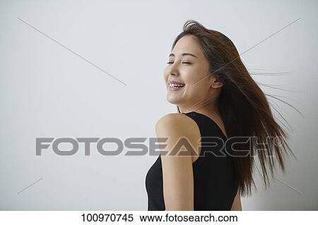 Studio portrait of attractive young Japanese woman View Large Photo Image Stock Photography - Studio portrait of attractive young Japanese woman. Fotosearch
