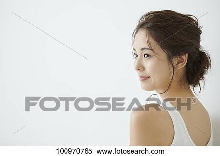 Studio portrait of attractive young Japanese woman View Large Photo Image Stock Photography - Studio portrait of attractive young Japanese woman. Fotosearch