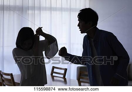 Picture - Unhappy Japanese family. Fotosearch