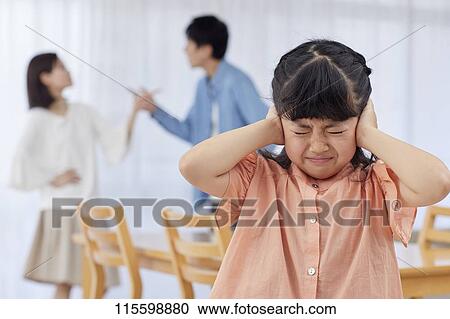 Stock Image - Unhappy Japanese family. Fotosearch