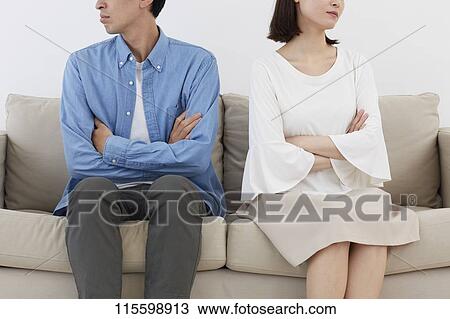 Stock Image - Unhappy Japanese family. Fotosearch