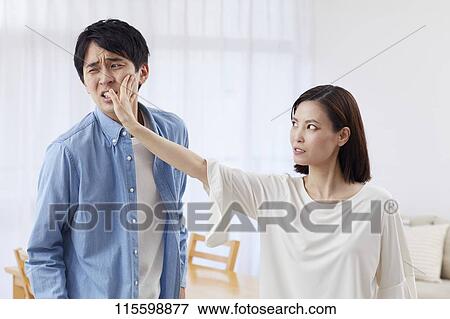 Unhappy Japanese family View Large Photo Image Stock Photo - Unhappy Japanese family. Fotosearch