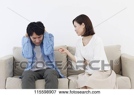 Stock Photo - Unhappy Japanese family. Fotosearch