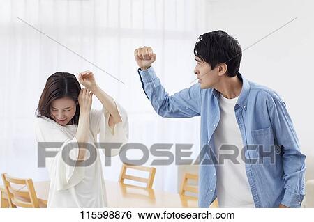 Stock Photograph - Unhappy Japanese family. Fotosearch