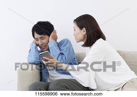 Stock Photograph - Unhappy Japanese family. Fotosearch