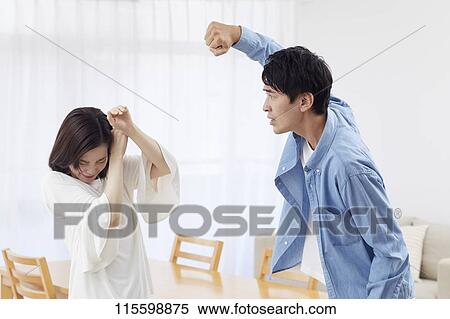 Stock Photography - Unhappy Japanese family. Fotosearch
