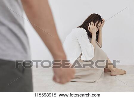 Stock Photography - Unhappy Japanese family. Fotosearch