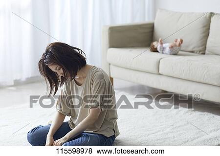 Unhappy Japanese mother with newborn baby View Large Photo Image Stock Photo - Unhappy Japanese mother with newborn baby. Fotosearch