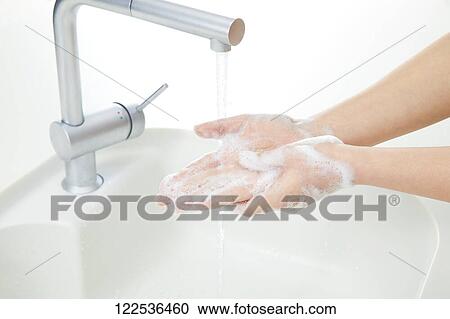 Woman washing hands View Large Photo Image Stock Image - Woman washing hands. Fotosearch