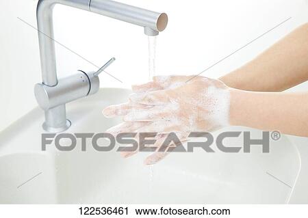 Woman washing hands View Large Photo Image Stock Image - Woman washing hands. Fotosearch