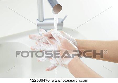Woman washing hands View Large Photo Image Stock Image - Woman washing hands. Fotosearch