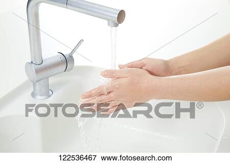 Woman washing hands View Large Photo Image Stock Photo - Woman washing hands. Fotosearch