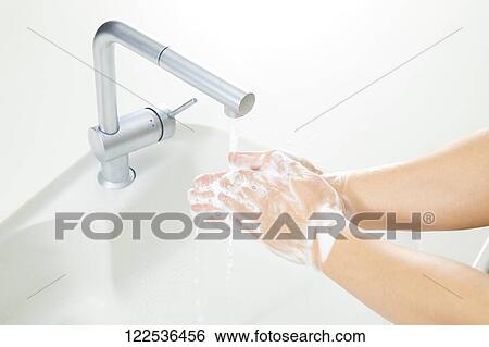 Woman washing hands View Large Photo Image Stock Photograph - Woman washing hands. Fotosearch