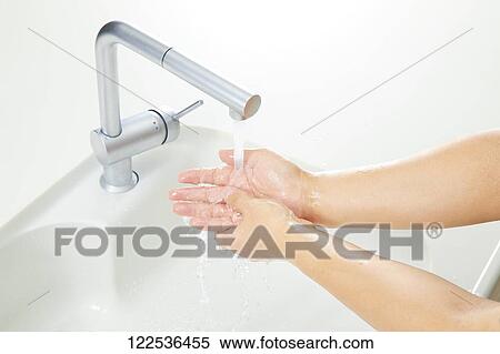 Woman washing hands View Large Photo Image Stock Photography - Woman washing hands. Fotosearch