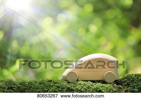 Wooden model car in the woods View Large Photo Image Stock Photo - Wooden model car in the woods. Fotosearch
