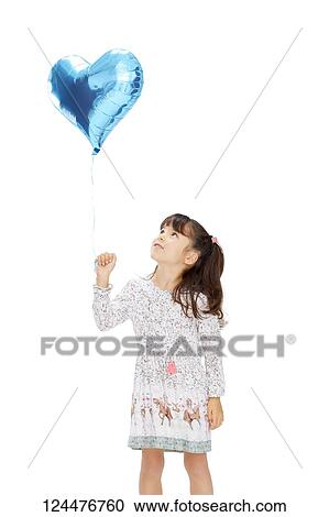 Stock Image - Young happy girl studio portrait. Fotosearch