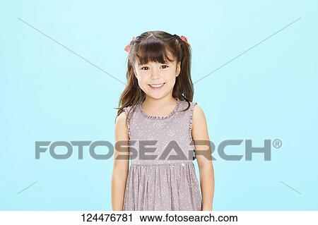 Young happy girl studio portrait View Large Photo Image Stock Image - Young happy girl studio portrait. Fotosearch