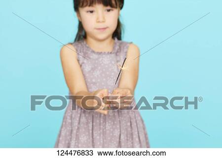 Young happy girl studio portrait View Large Photo Image Stock Image - Young happy girl studio portrait. Fotosearch