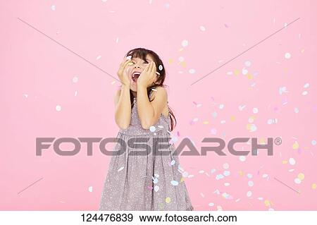 Young happy girl studio portrait View Large Photo Image Stock Photo - Young happy girl studio portrait. Fotosearch