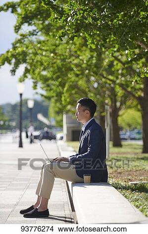 Young Japanese businessman downtown Tokyo View Large Photo Image Picture - Young Japanese businessman downtown Tokyo. Fotosearch