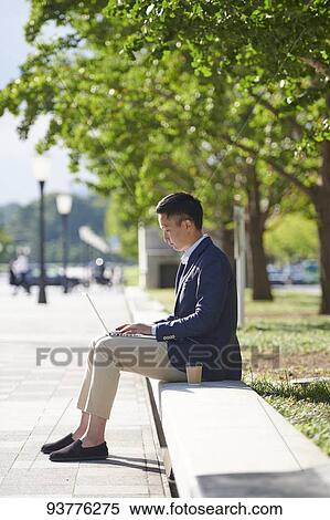 Young Japanese businessman downtown Tokyo View Large Photo Image Stock Photography - Young Japanese businessman downtown Tokyo. Fotosearch