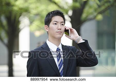 Young Japanese businessman View Large Photo Image Picture - Young Japanese businessman. Fotosearch
