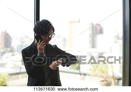 Stock Image - Young Japanese businessman. Fotosearch